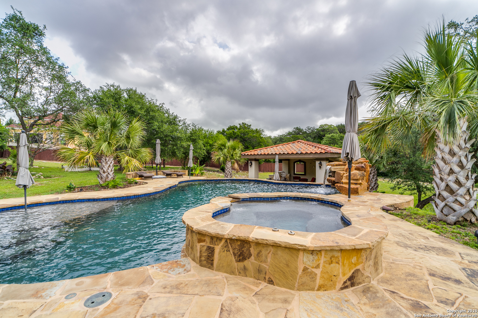 714 Ruidosa Downs Helotes, TX 78023 - Photo 37 of 42 a view of swimming pool with seating space
