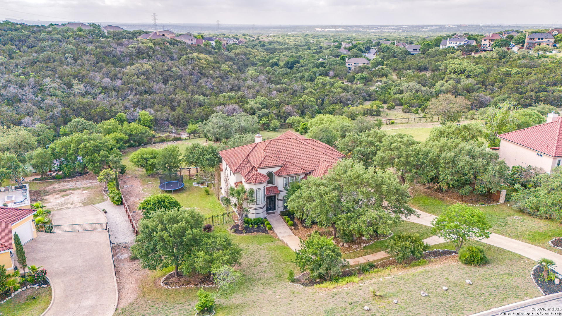 714 Ruidosa Downs Helotes, TX 78023 - Photo 40 of 42 an aerial view of house with yard