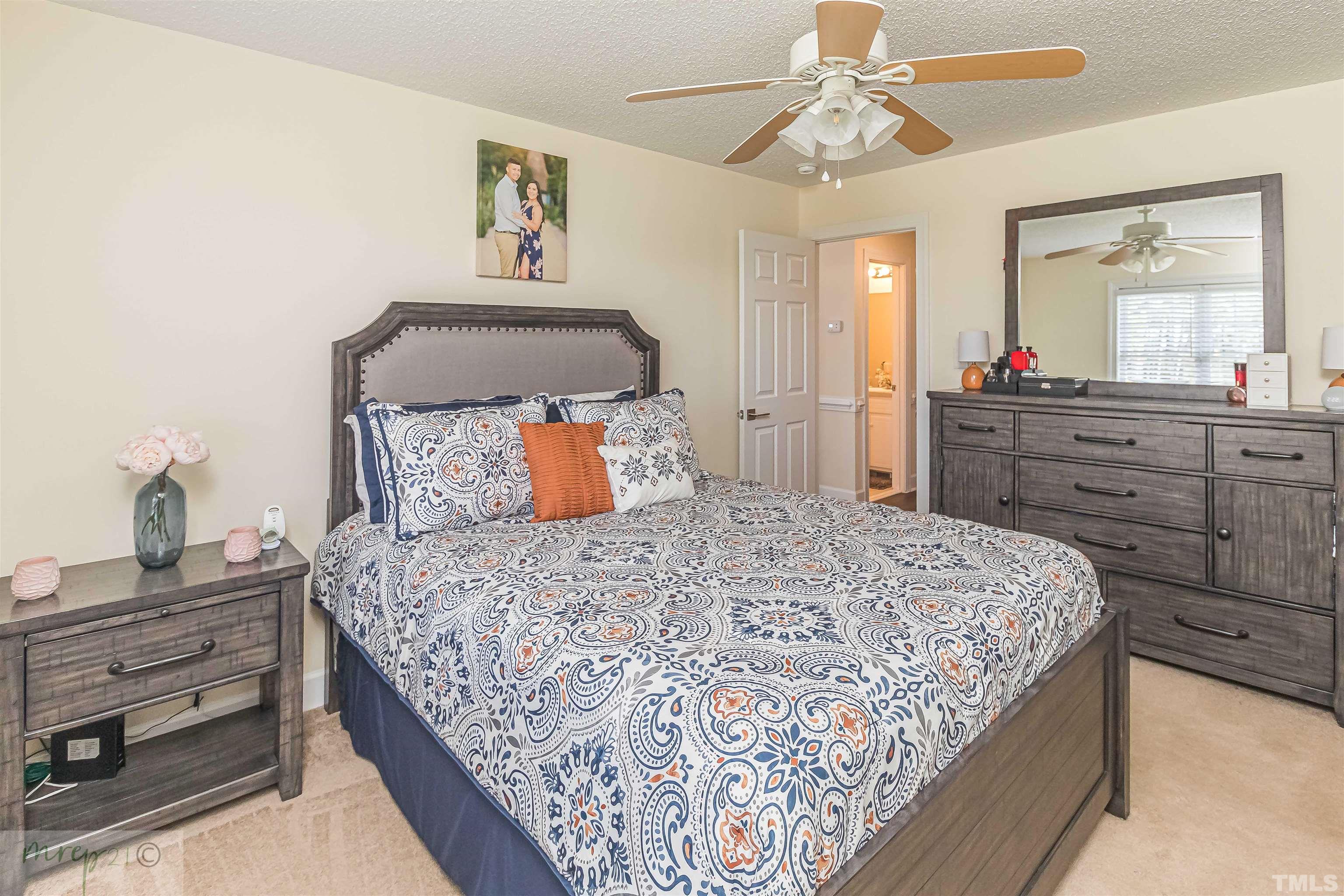15838 Old Smithfield Road Sims, NC 27880 - Photo 12 of 27 a bedroom with a bed and a dresser