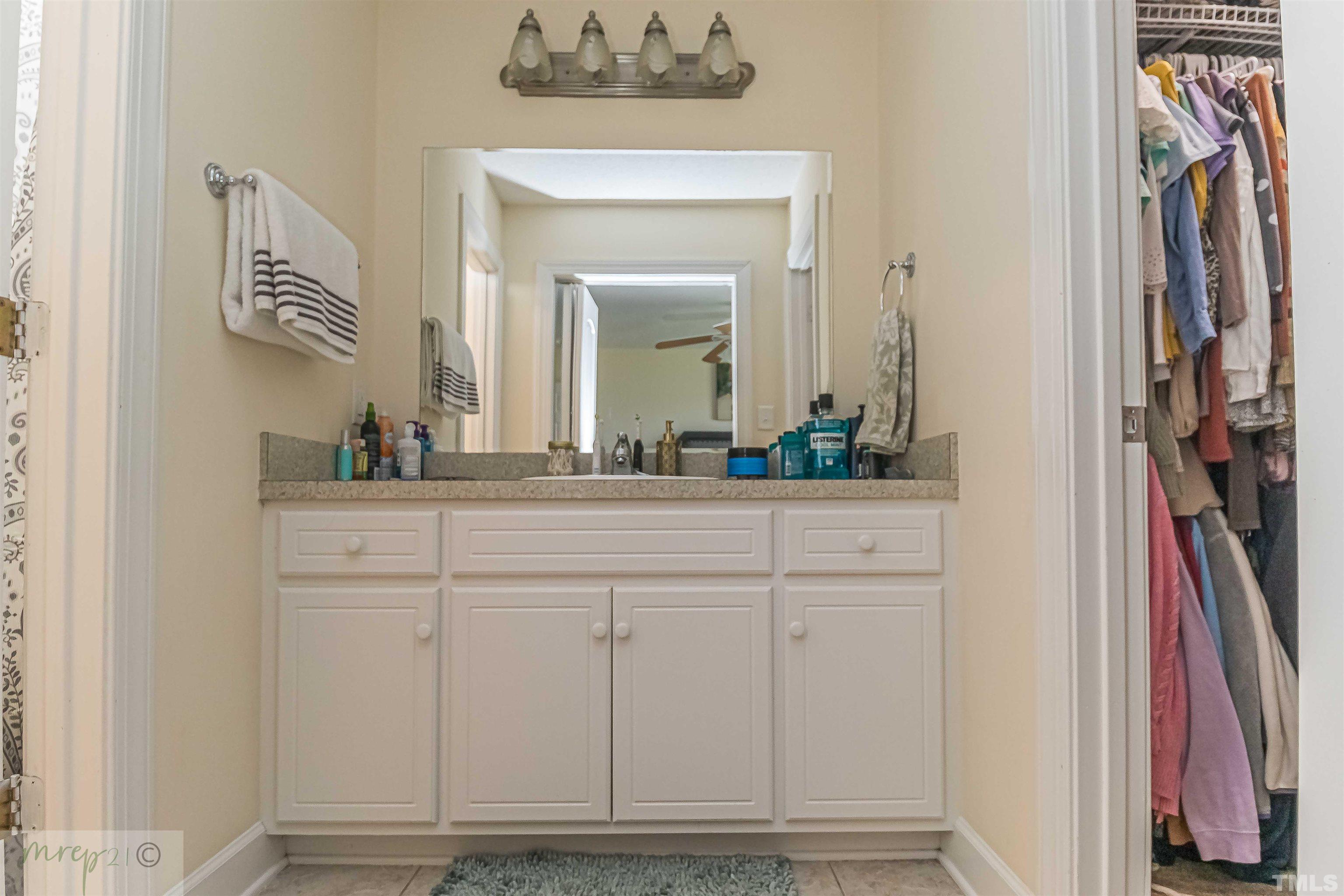 15838 Old Smithfield Road Sims, NC 27880 - Photo 15 of 27 a bathroom with a sink and a mirror