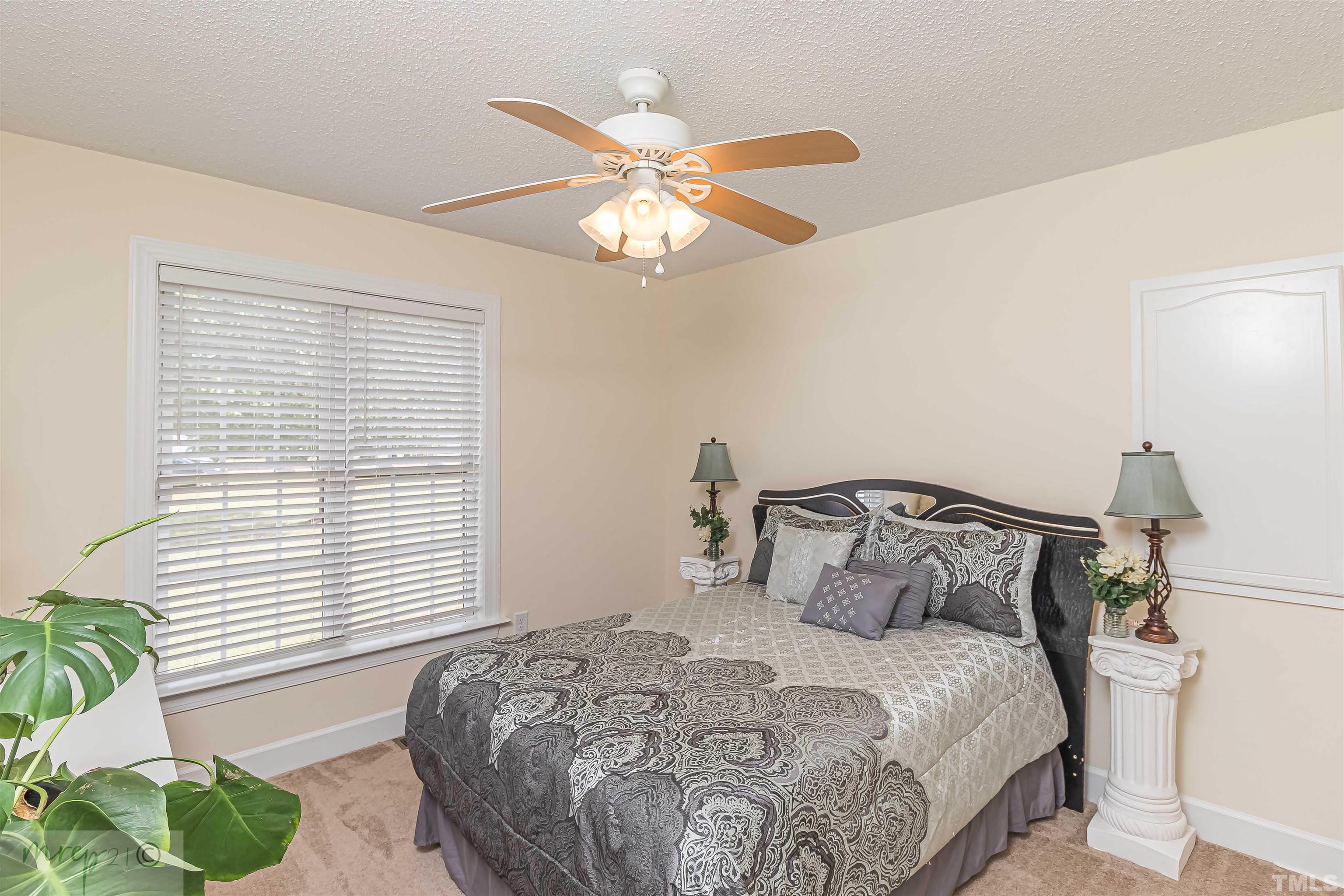 15838 Old Smithfield Road Sims, NC 27880 - Photo 16 of 27 a bedroom with a bed and a window