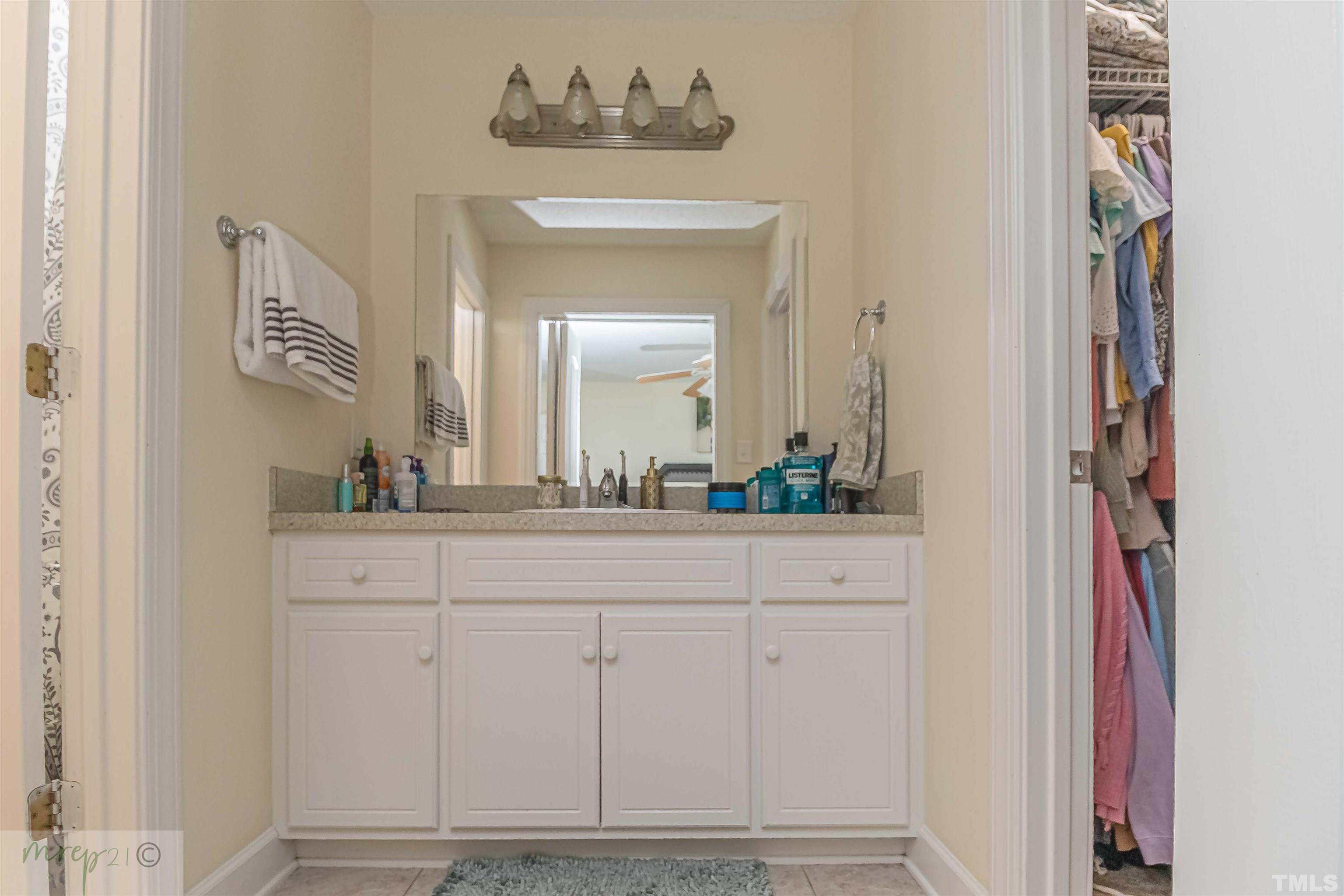 15838 Old Smithfield Road Sims, NC 27880 - Photo 19 of 27 a bathroom with a sink and a mirror