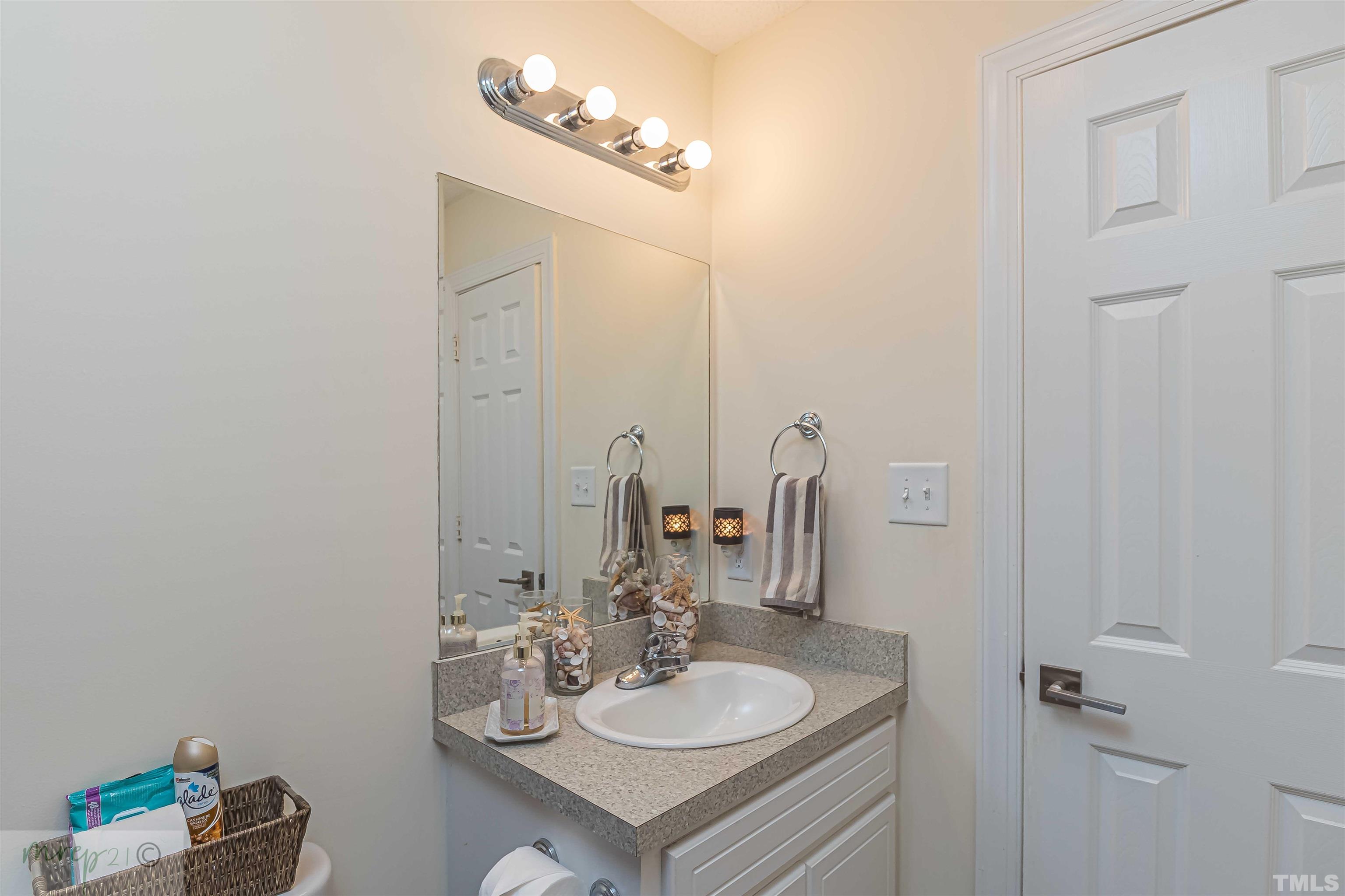 15838 Old Smithfield Road Sims, NC 27880 - Photo 20 of 27 a bathroom with a sink and a mirror
