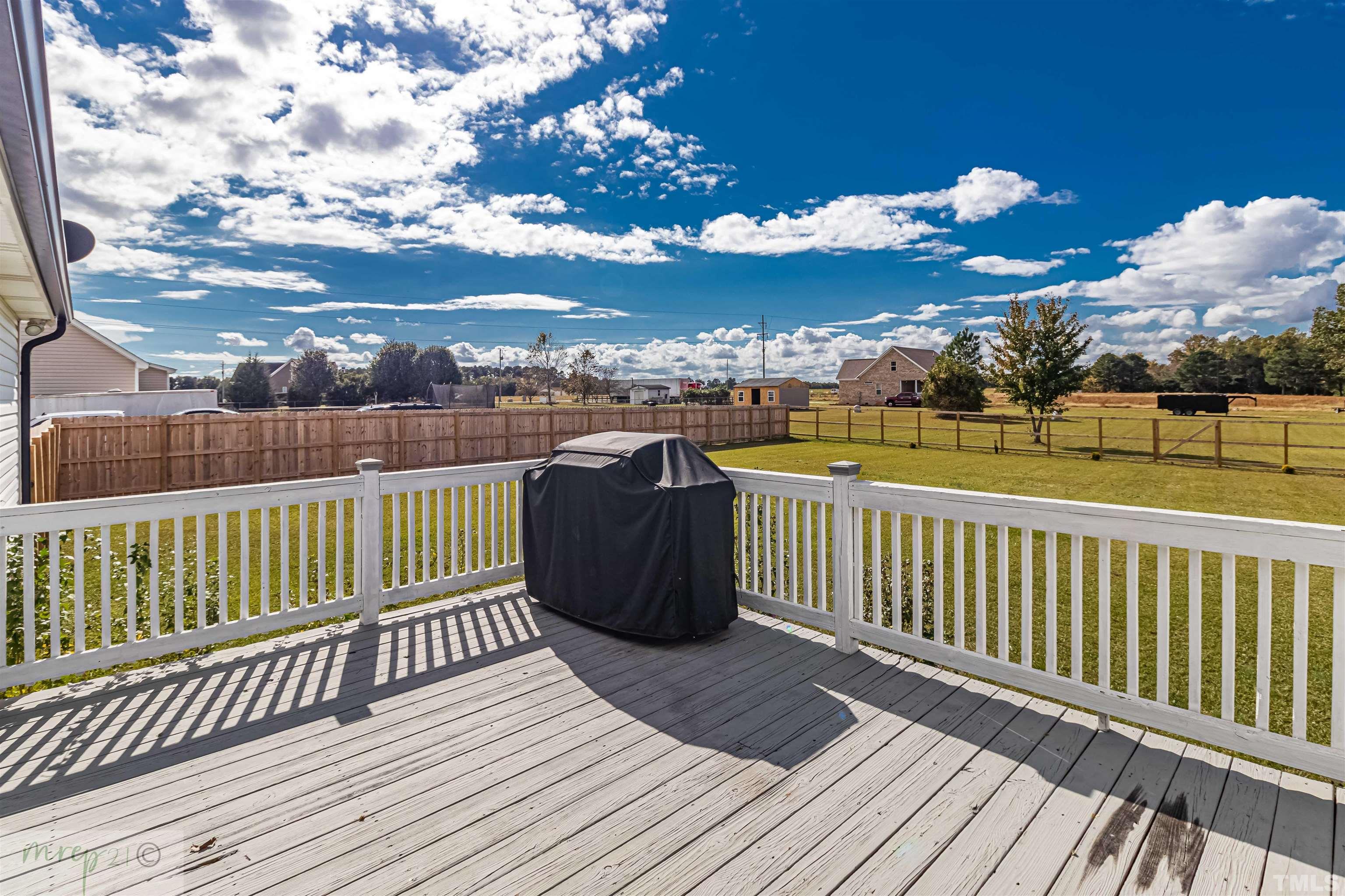 15838 Old Smithfield Road Sims, NC 27880 - Photo 21 of 27 a view of a balcony with wooden floor