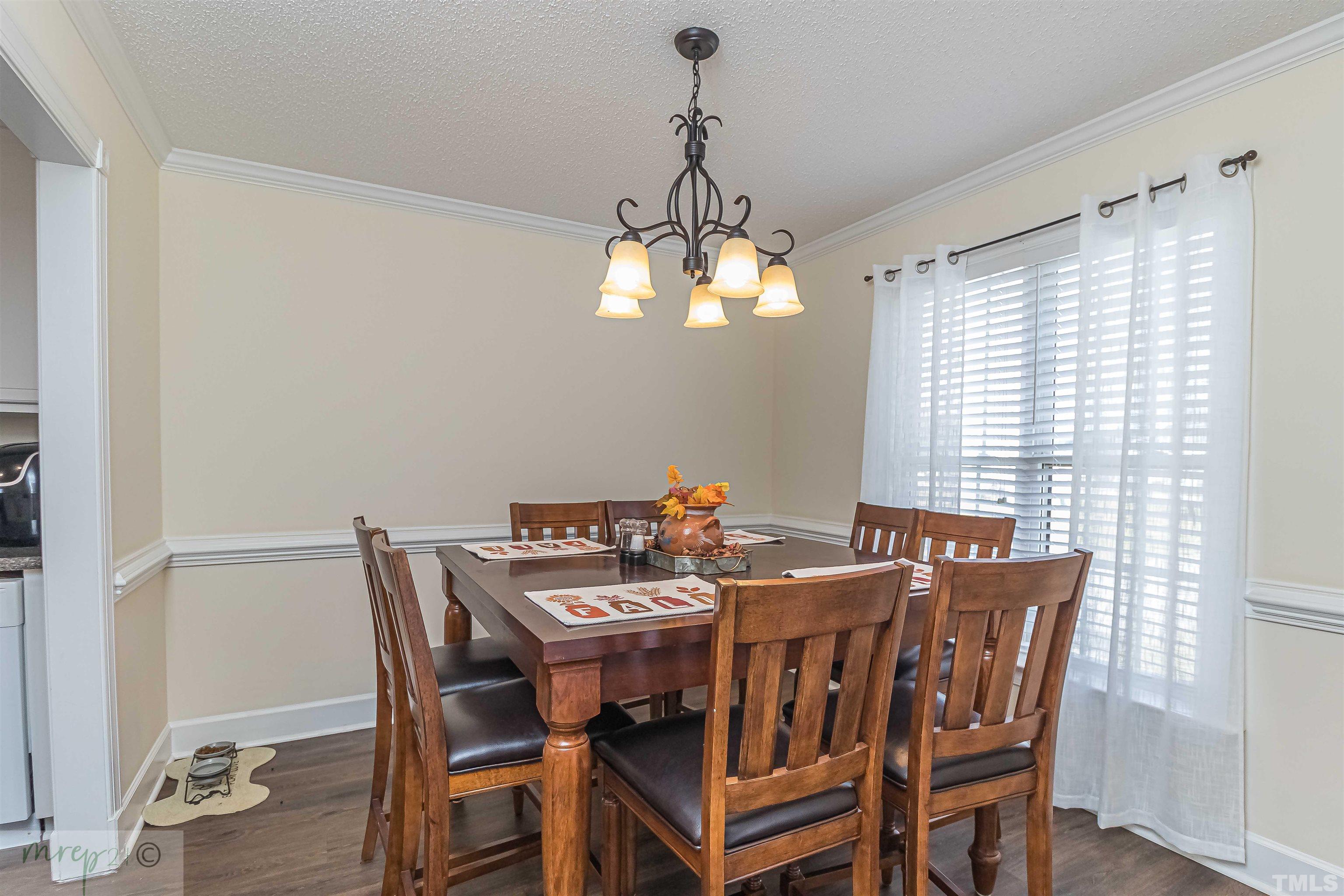15838 Old Smithfield Road Sims, NC 27880 - Photo 5 of 27 a view of a dining room with furniture window and wooden floor