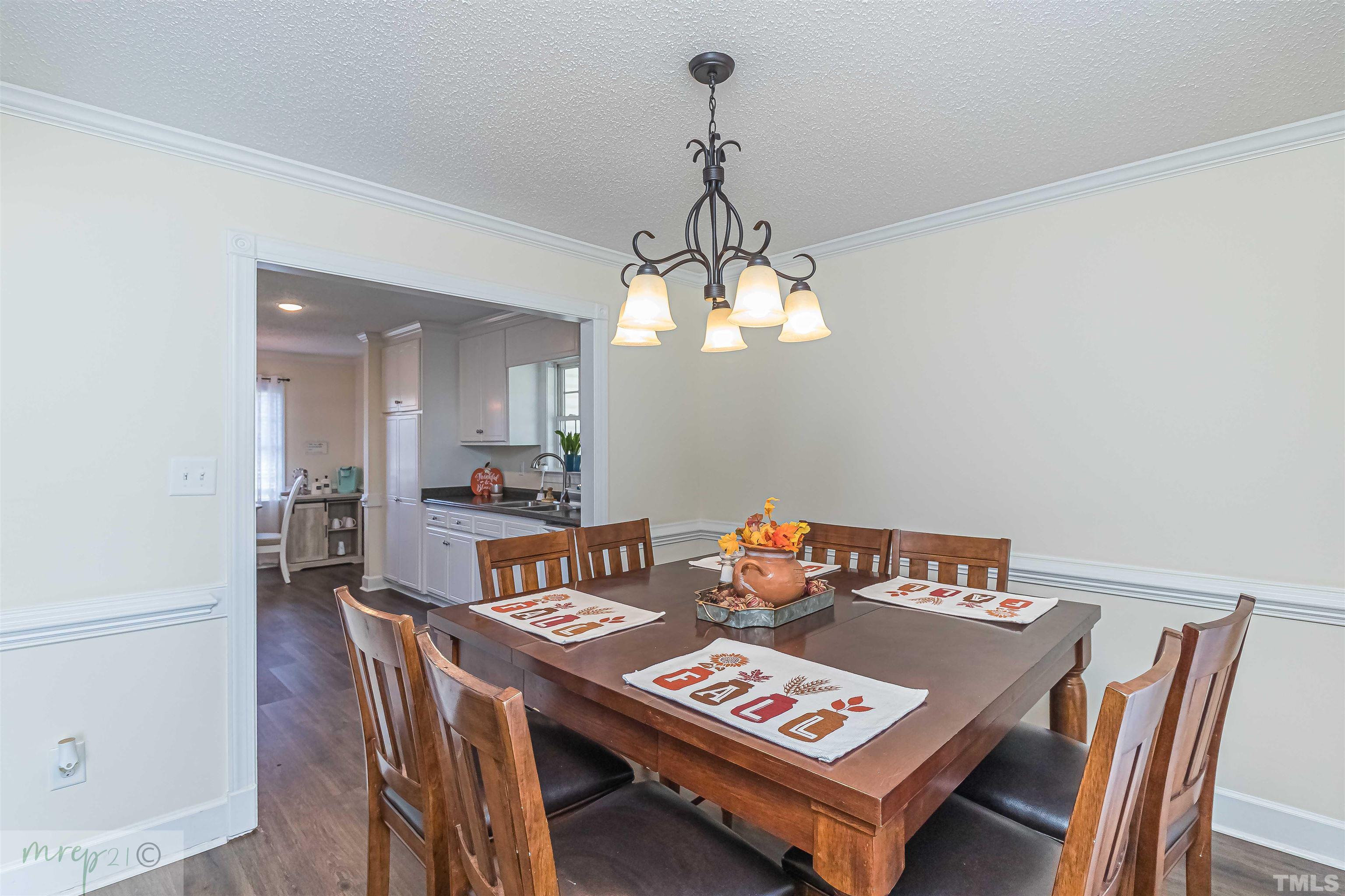 15838 Old Smithfield Road Sims, NC 27880 - Photo 6 of 27 a dining room with a table and chairs