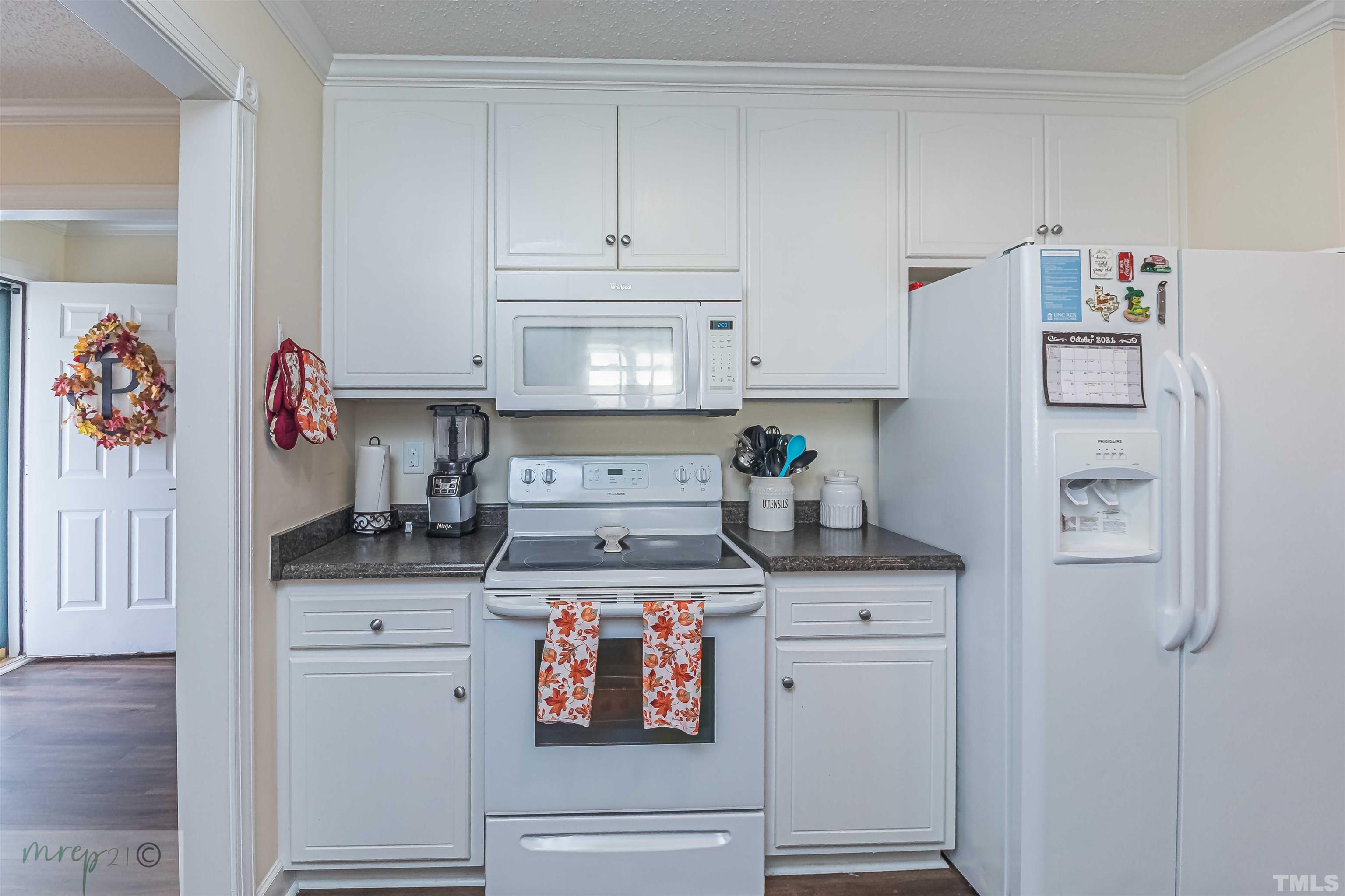 15838 Old Smithfield Road Sims, NC 27880 - Photo 10 of 27 a kitchen with stainless steel appliances granite countertop a refrigerator and a stove