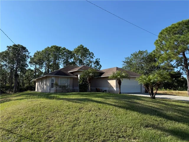 a house view with a garden space