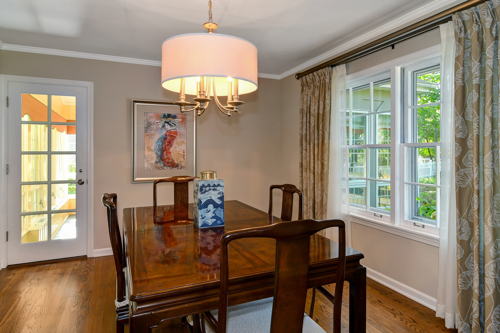1124 Woodview Road Burr Ridge, IL 60527 - Photo 8 of 27 a view of a dining room with furniture window and outside view