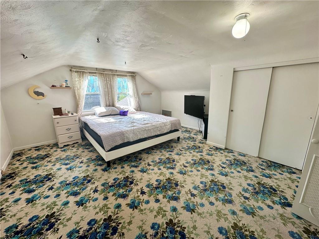 514 Southern Avenue Kittanning, PA 16201 - Photo 19 of 27 a bedroom with a bed and a flat tv screen on dresser