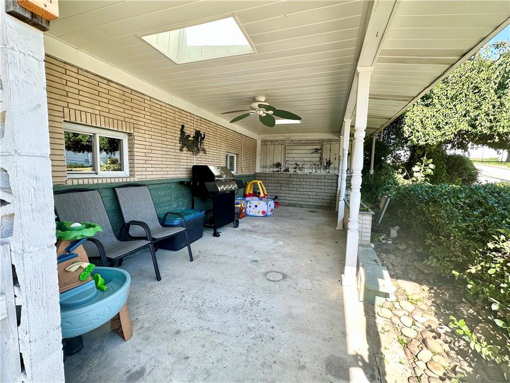 514 Southern Avenue Kittanning, PA 16201 - Photo 20 of 27 a view of a patio with table and chairs potted plants with wooden floor