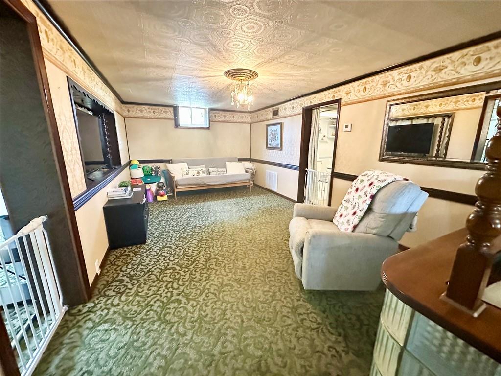 514 Southern Avenue Kittanning, PA 16201 - Photo 7 of 27 a living room with furniture and a flat screen tv