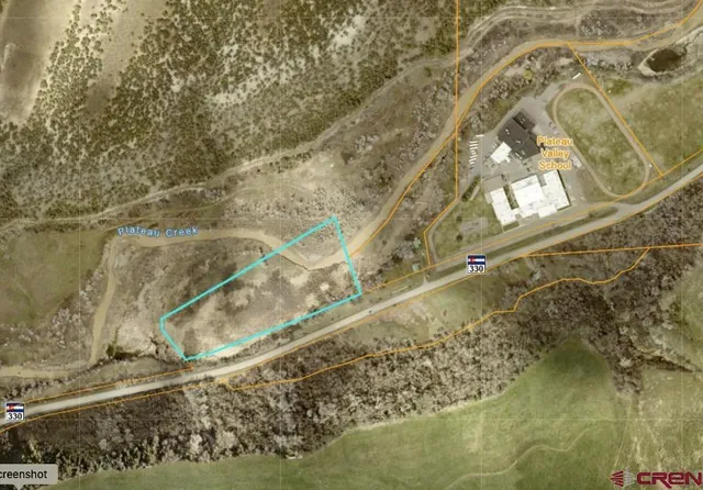 a view of lake with green space