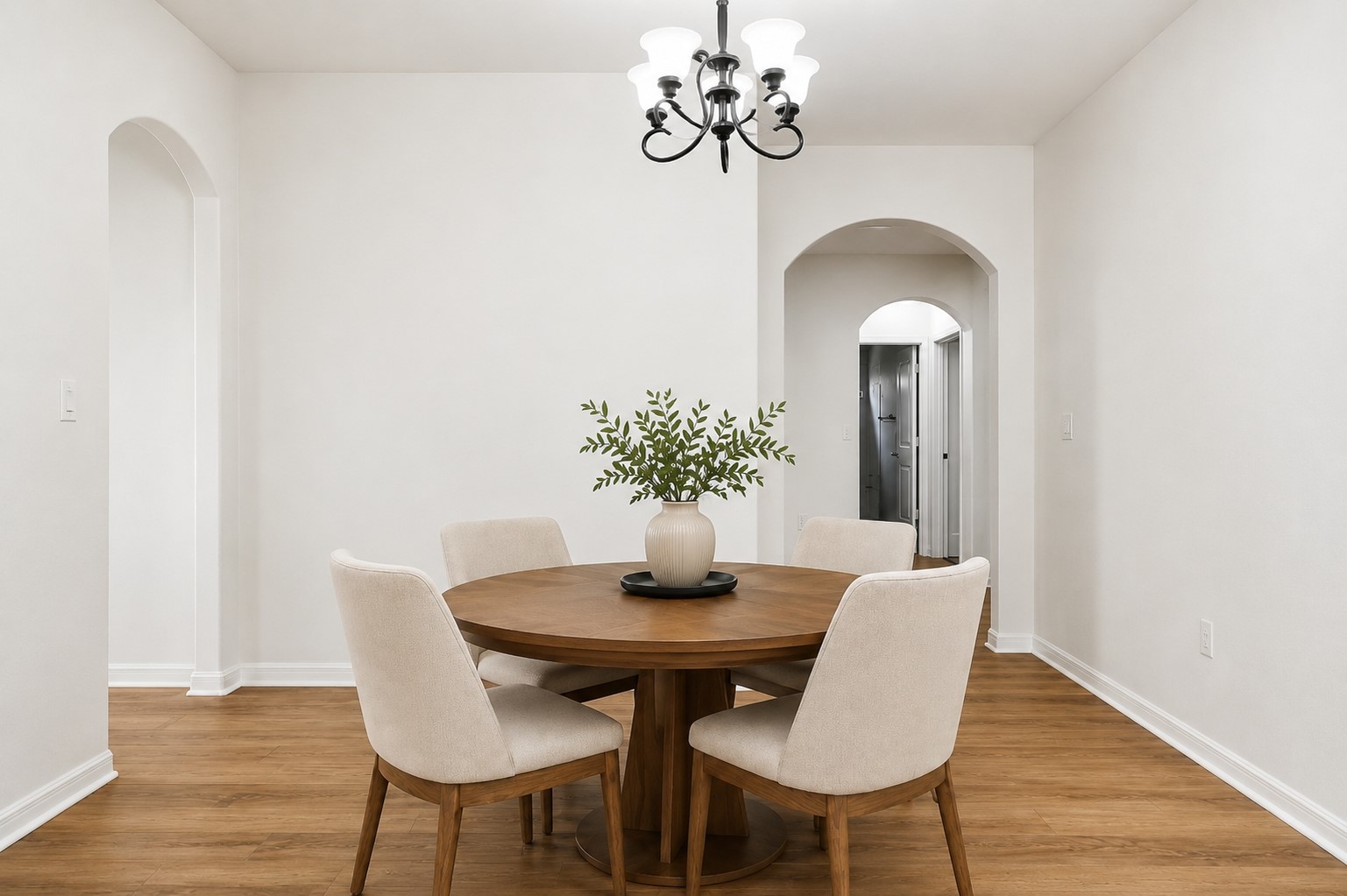 304 Santa Maria Street Georgetown, TX 78628 - Photo 6 of 37 Archways gracefully frame the entrance to this inviting dining area, ideal for intimate gatherings. Virtually Staged.