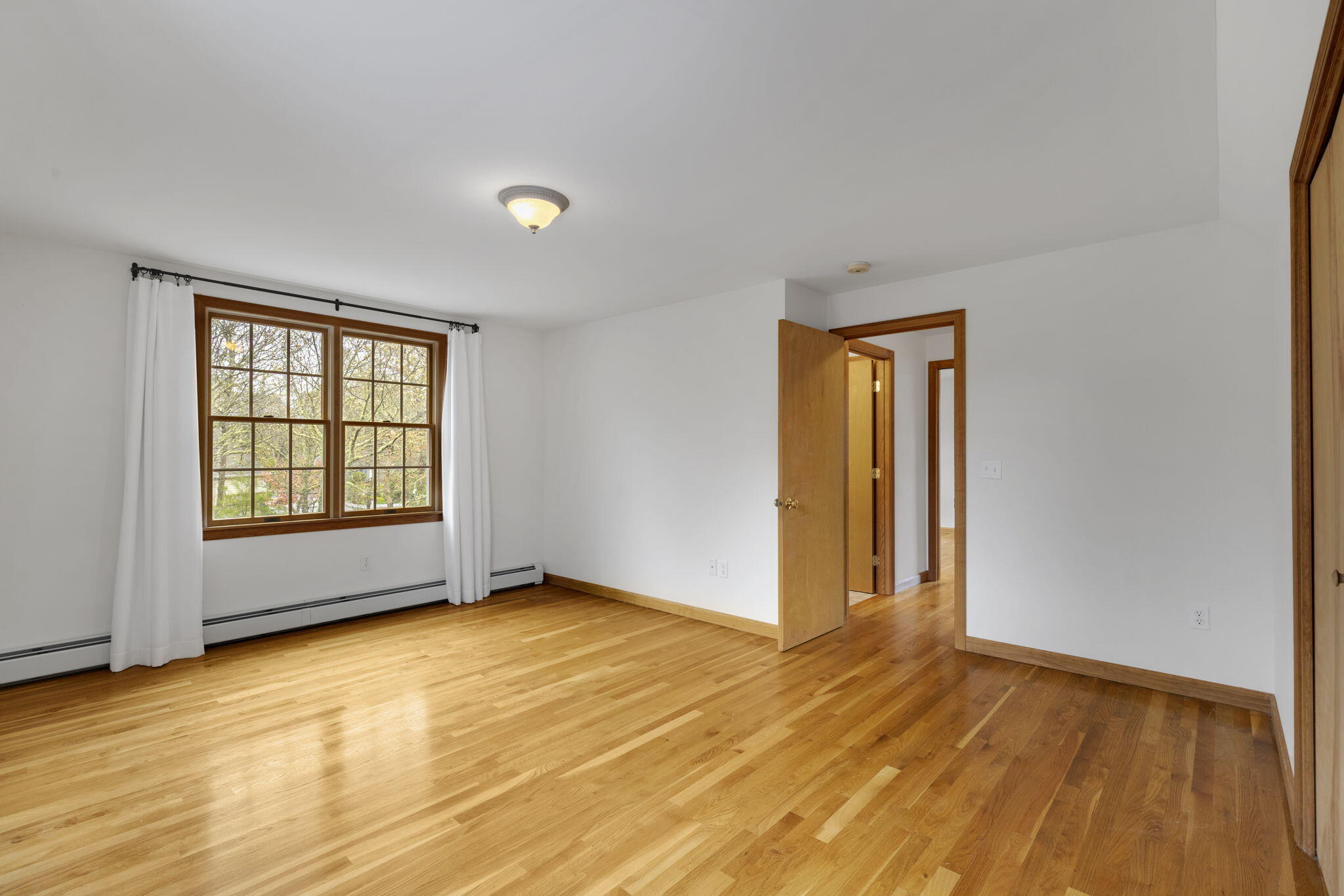 65 Whitney Road Eastham, MA 02642 - Photo 27 of 41 a view of an empty room with glass door