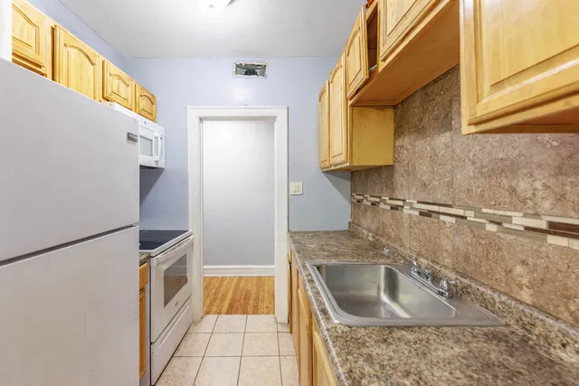 a bathroom with a sink and a bathtub