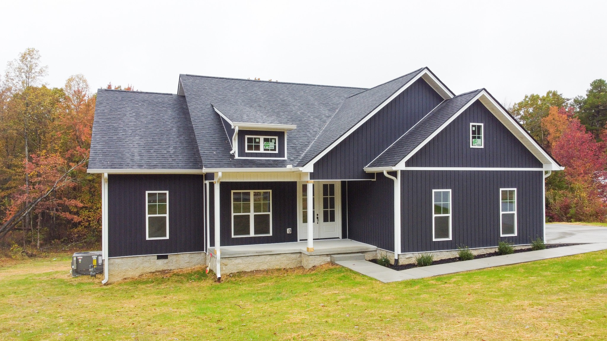 a front view of a house with yard