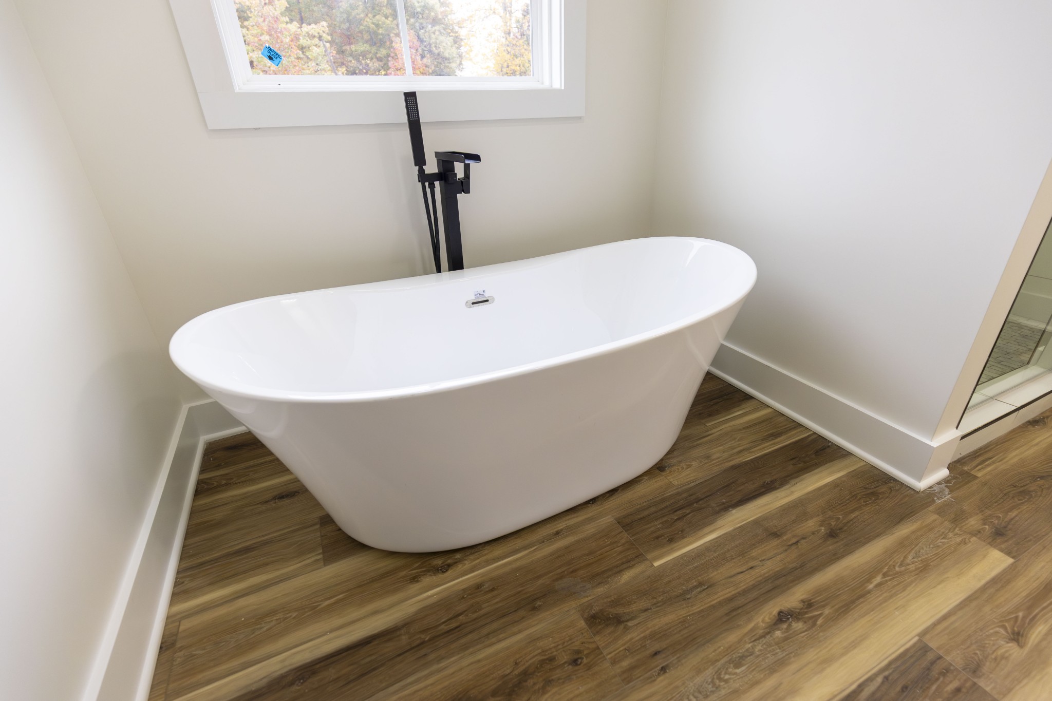 371 West Meadow Creek Road Monterey, TN 38574 - Photo 19 of 32 a white bath tub sitting in a bathroom