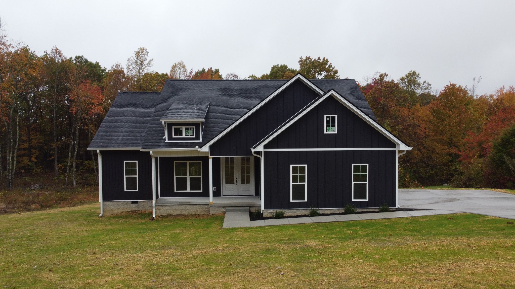 371 West Meadow Creek Road Monterey, TN 38574 - Photo 2 of 32 a front view of a house with a yard