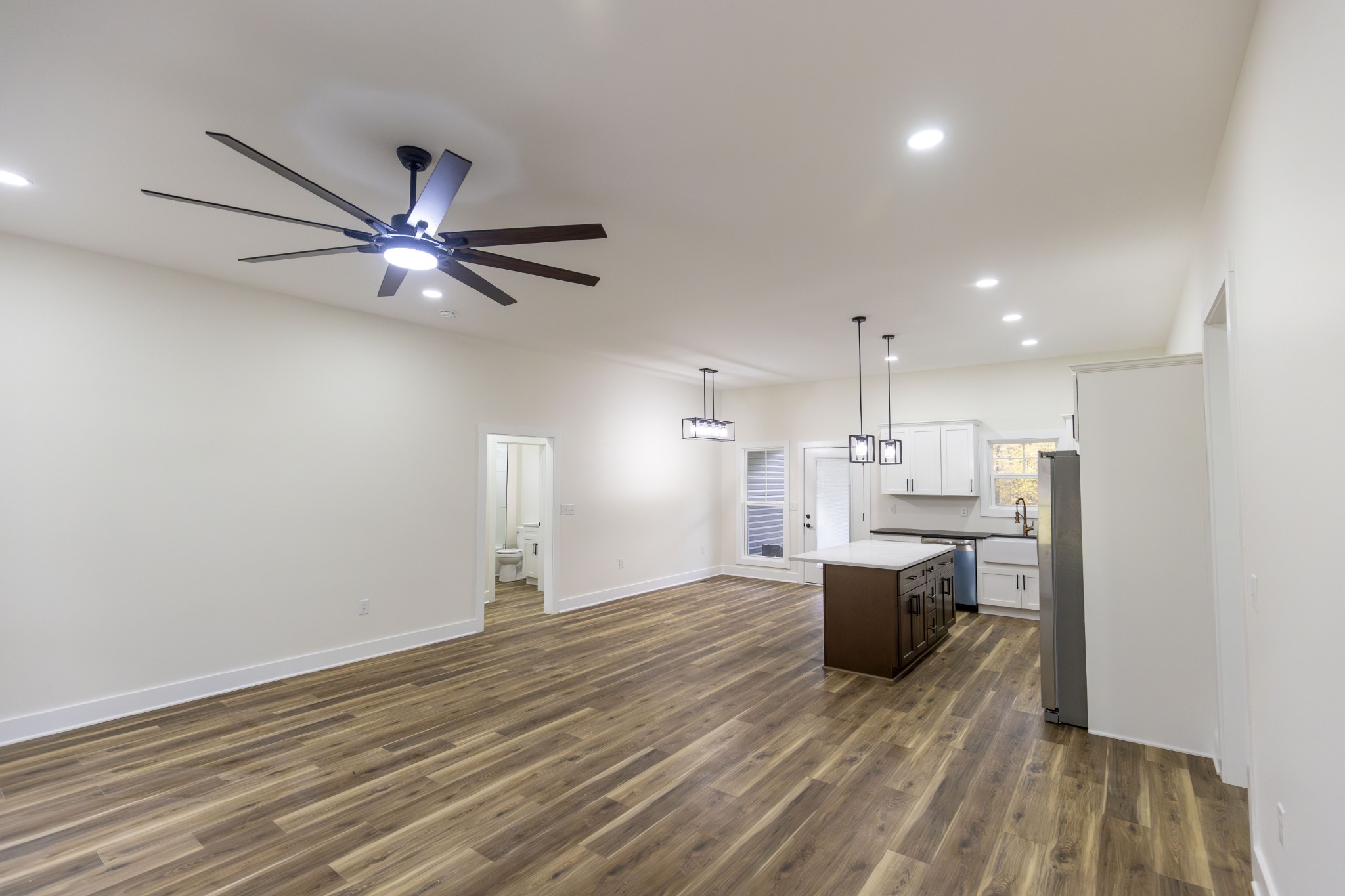371 West Meadow Creek Road Monterey, TN 38574 - Photo 7 of 32 a view of a kitchen with a sink and a refrigerator