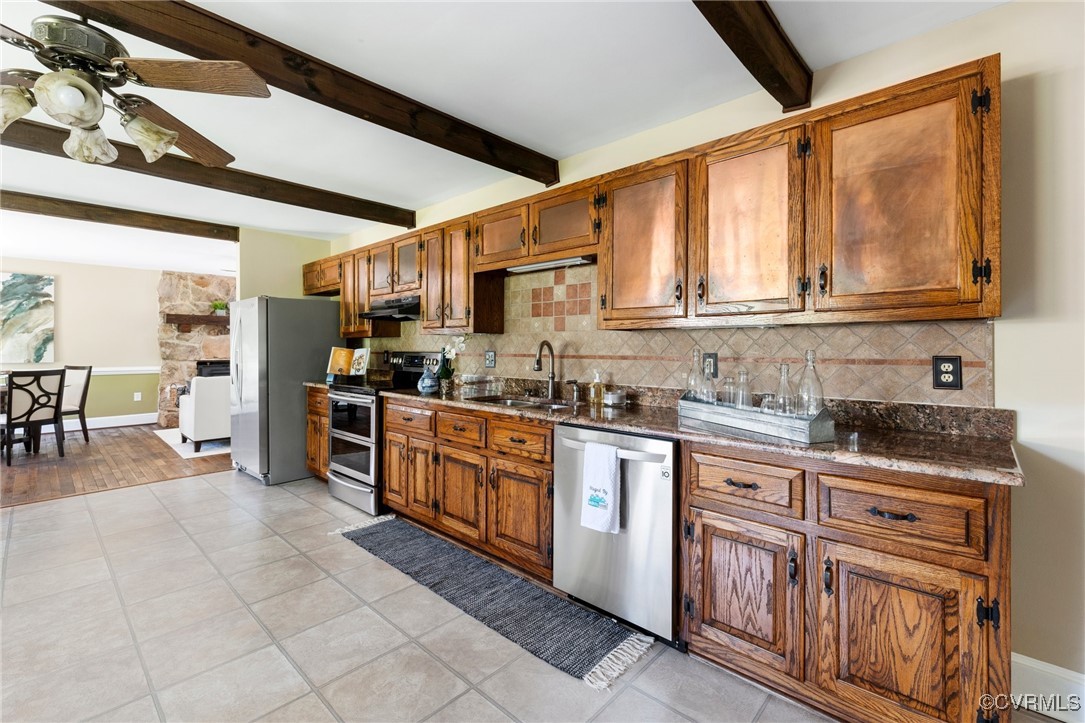 14398 Mountain Road Ashland, VA 23005 - Photo 15 of 36 a kitchen with stainless steel appliances granite countertop a stove sink and cabinets