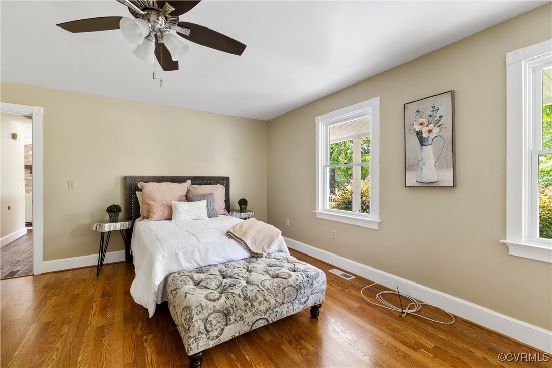 14398 Mountain Road Ashland, VA 23005 - Photo 19 of 36 a bedroom with a bed and wooden floor