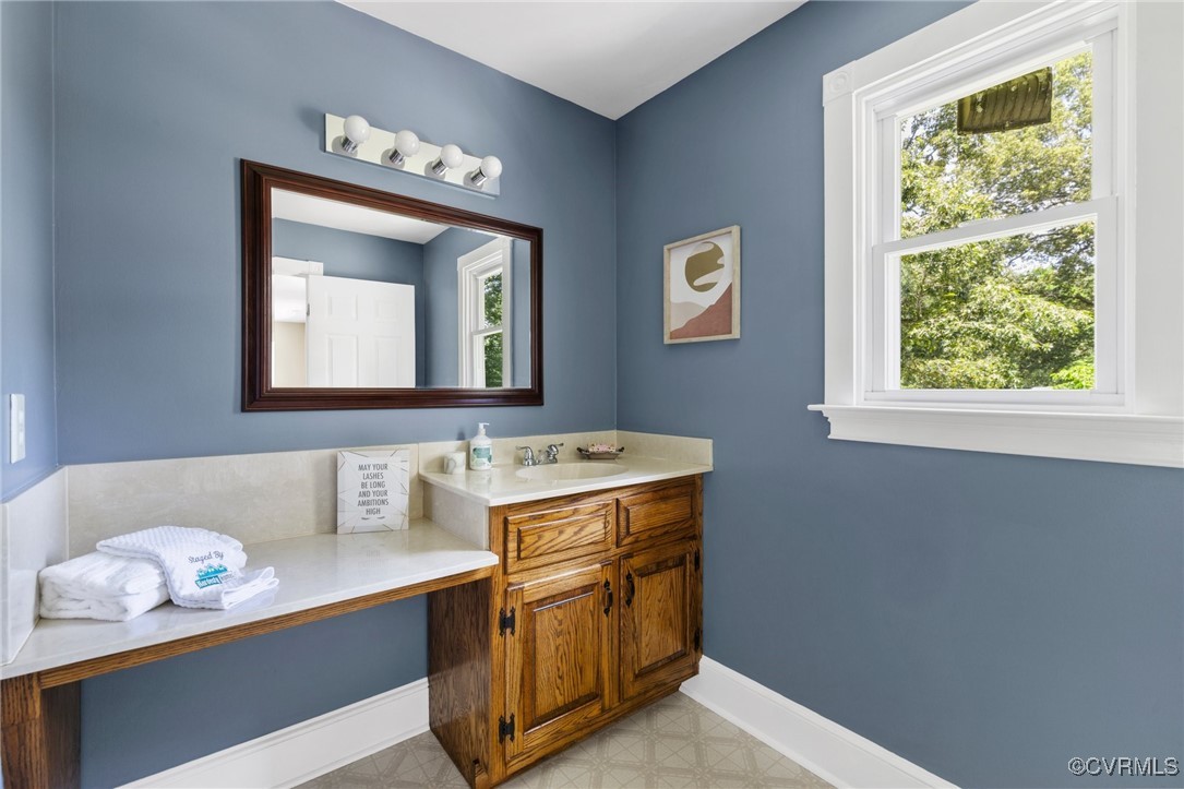 14398 Mountain Road Ashland, VA 23005 - Photo 24 of 36 a room with cabinets washer and dryer
