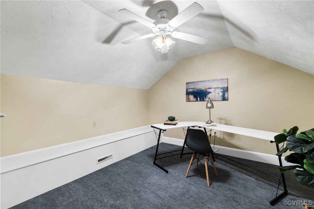 14398 Mountain Road Ashland, VA 23005 - Photo 27 of 36 a workspace with a table and a couch