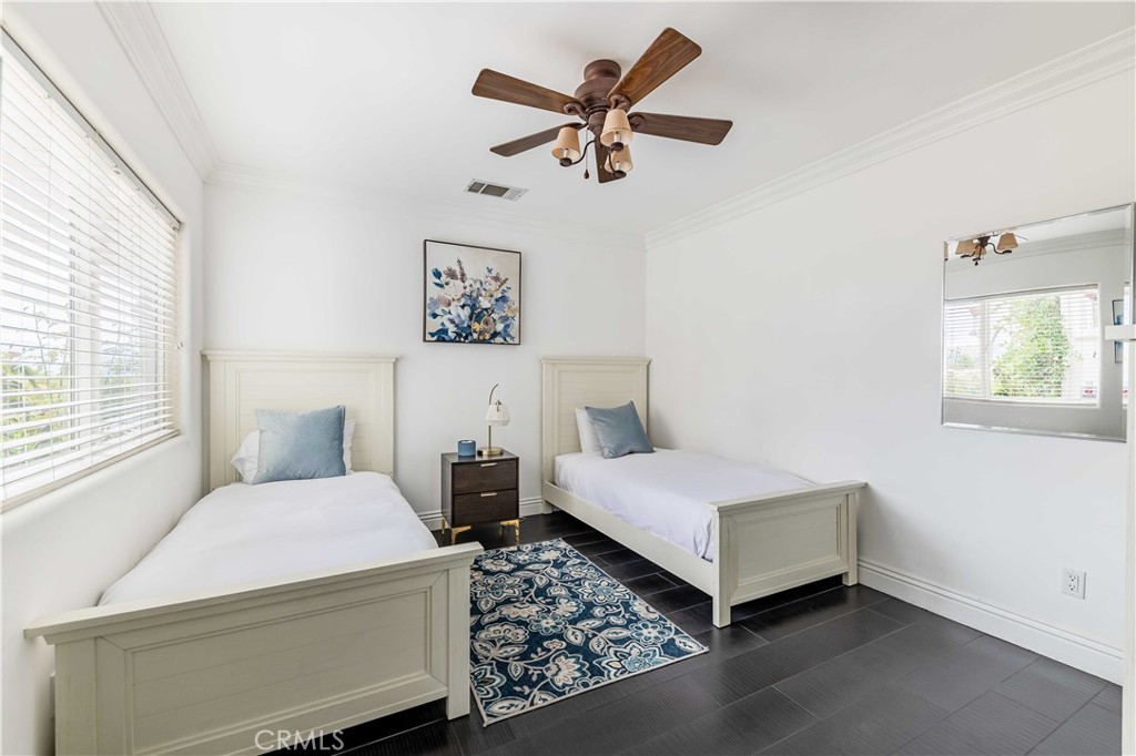 20491 Carancho Road Temecula, CA 92590 - Photo 11 of 64 a bedroom with a bed and a window