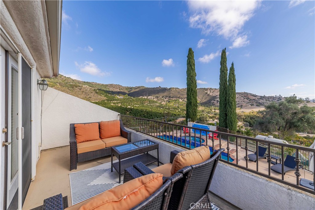 20491 Carancho Road Temecula, CA 92590 - Photo 35 of 64 a view of a city from a roof deck with furniture