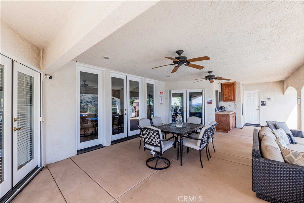 20491 Carancho Road Temecula, CA 92590 - Photo 39 of 64 a view of a livingroom with furniture and windows