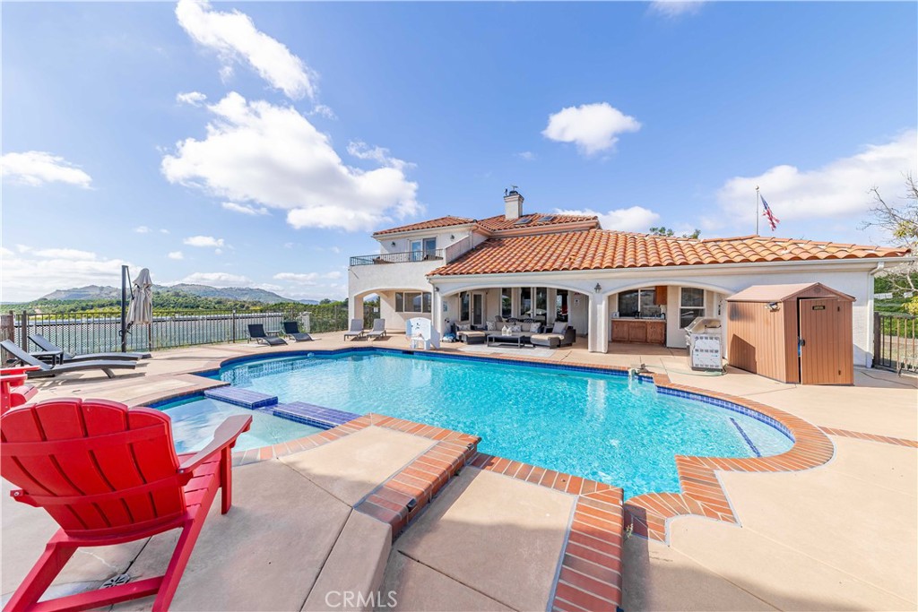 20491 Carancho Road Temecula, CA 92590 - Photo 43 of 64 a view of a house with swimming pool and sitting area