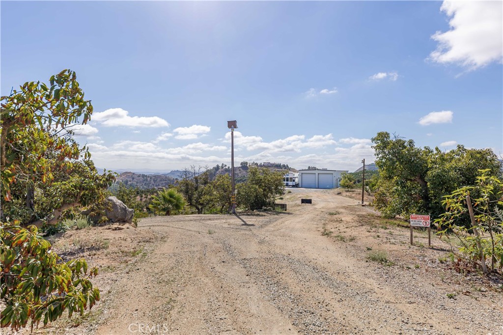 20491 Carancho Road Temecula, CA 92590 - Photo 49 of 64 a view of a dry yard with trees