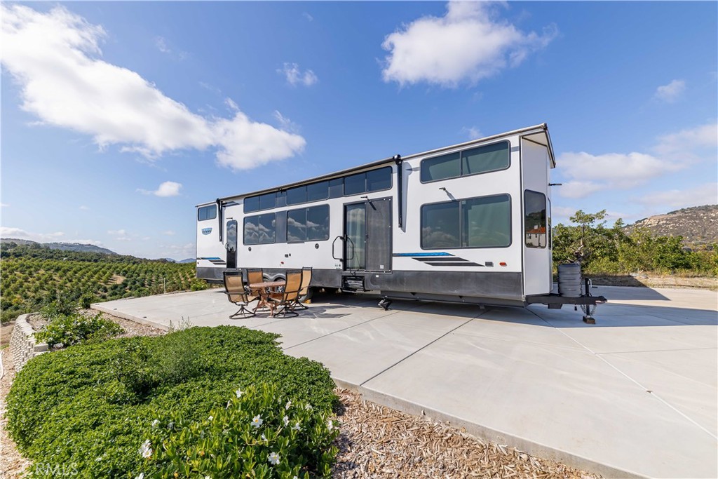 20491 Carancho Road Temecula, CA 92590 - Photo 53 of 64 a front view of a house with patio