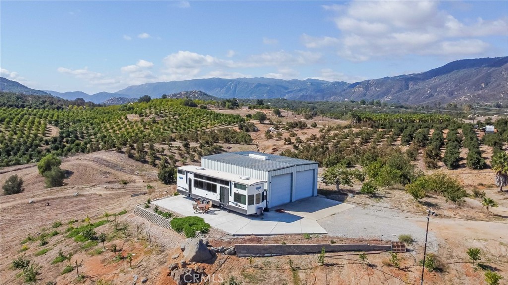 20491 Carancho Road Temecula, CA 92590 - Photo 62 of 64 a aerial view of a house with a garden