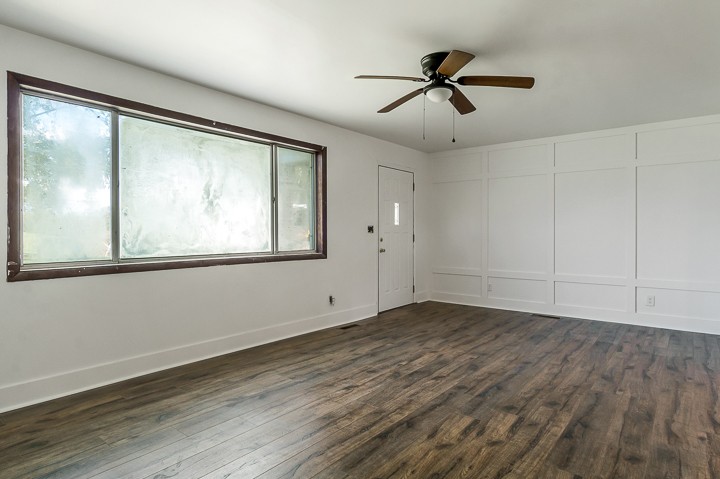 7640 Oak Grove Road Monroe, TN 38573 - Photo 2 of 31 a view of empty room with wooden floor and fan