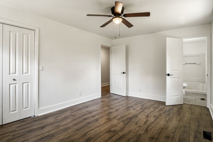 7640 Oak Grove Road Monroe, TN 38573 - Photo 13 of 31 a view of empty room with wooden floor and fan