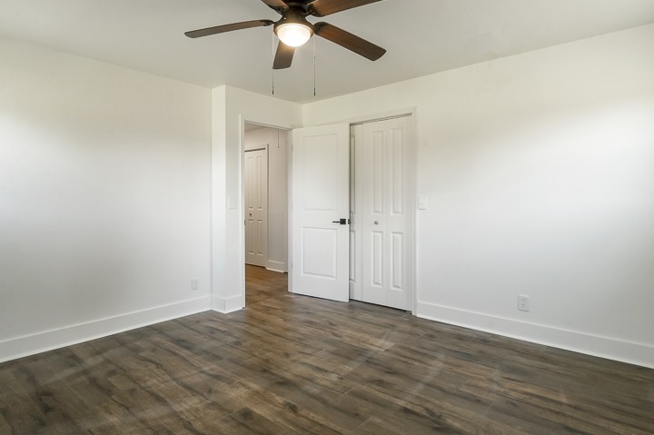 7640 Oak Grove Road Monroe, TN 38573 - Photo 16 of 31 a view of an empty room with wooden floor