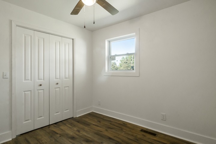 7640 Oak Grove Road Monroe, TN 38573 - Photo 18 of 31 wooden floor in an empty room with a window