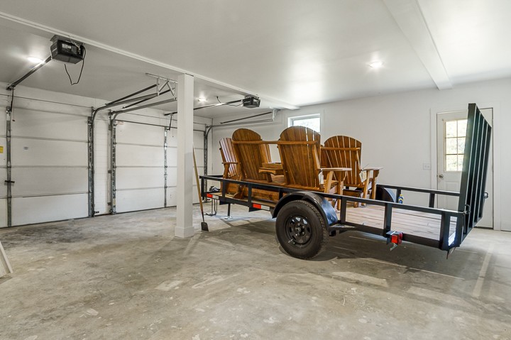 7640 Oak Grove Road Monroe, TN 38573 - Photo 20 of 31 a car is parked in a garage