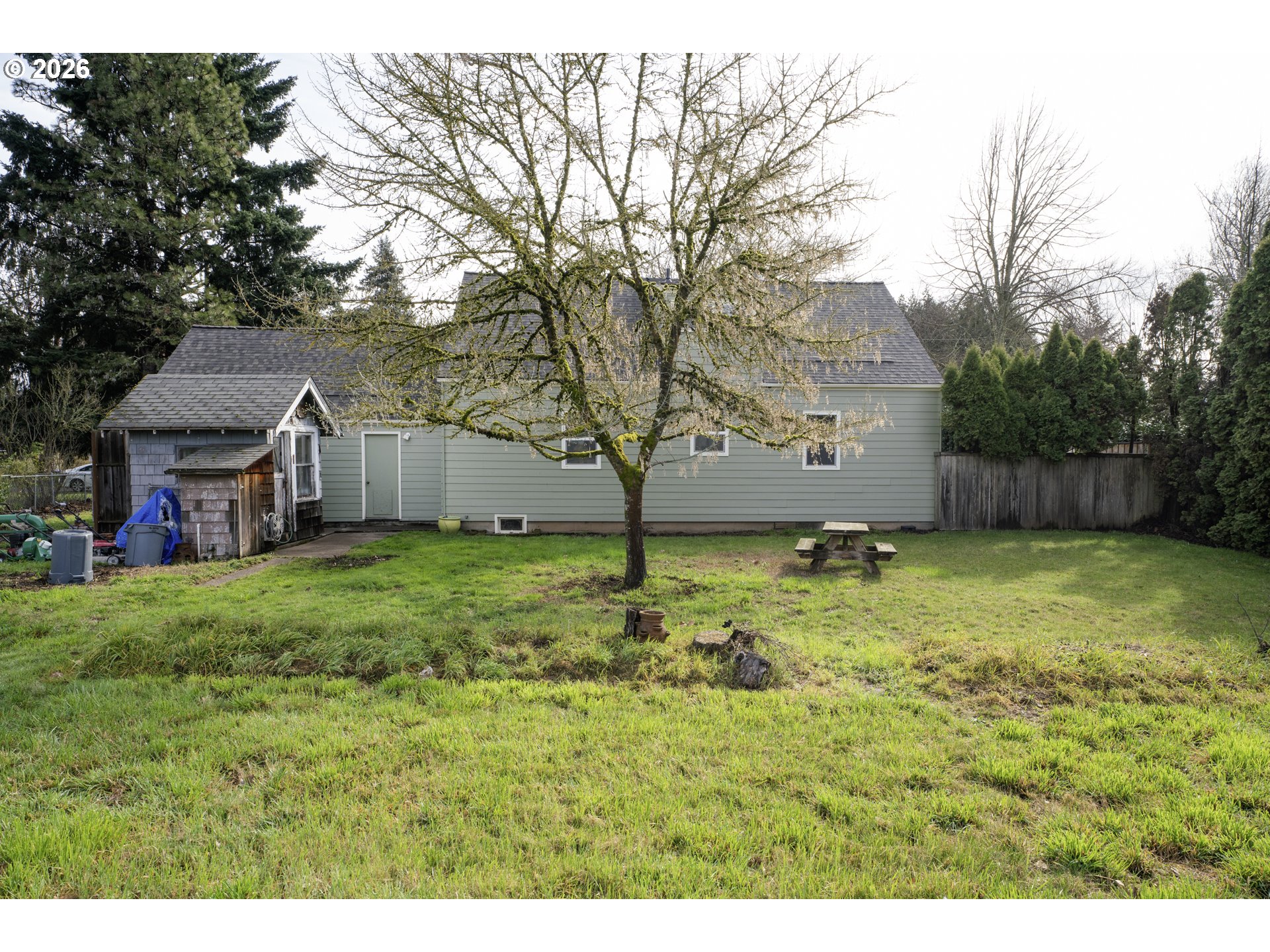 780 Cherry Avenue Eugene, OR 97404 - Photo 25 of 29 a backyard of a house with lots of green space