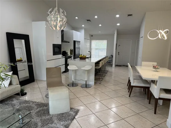 a view of a dining room with furniture