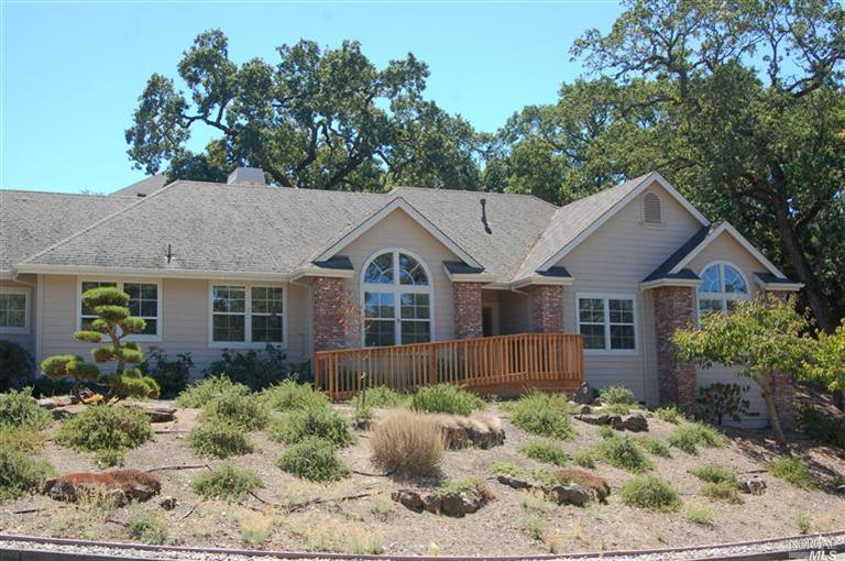 5966 Stone Bridge Road Santa Rosa, CA 95409 - Photo 1 of 1 a front view of a house with garden