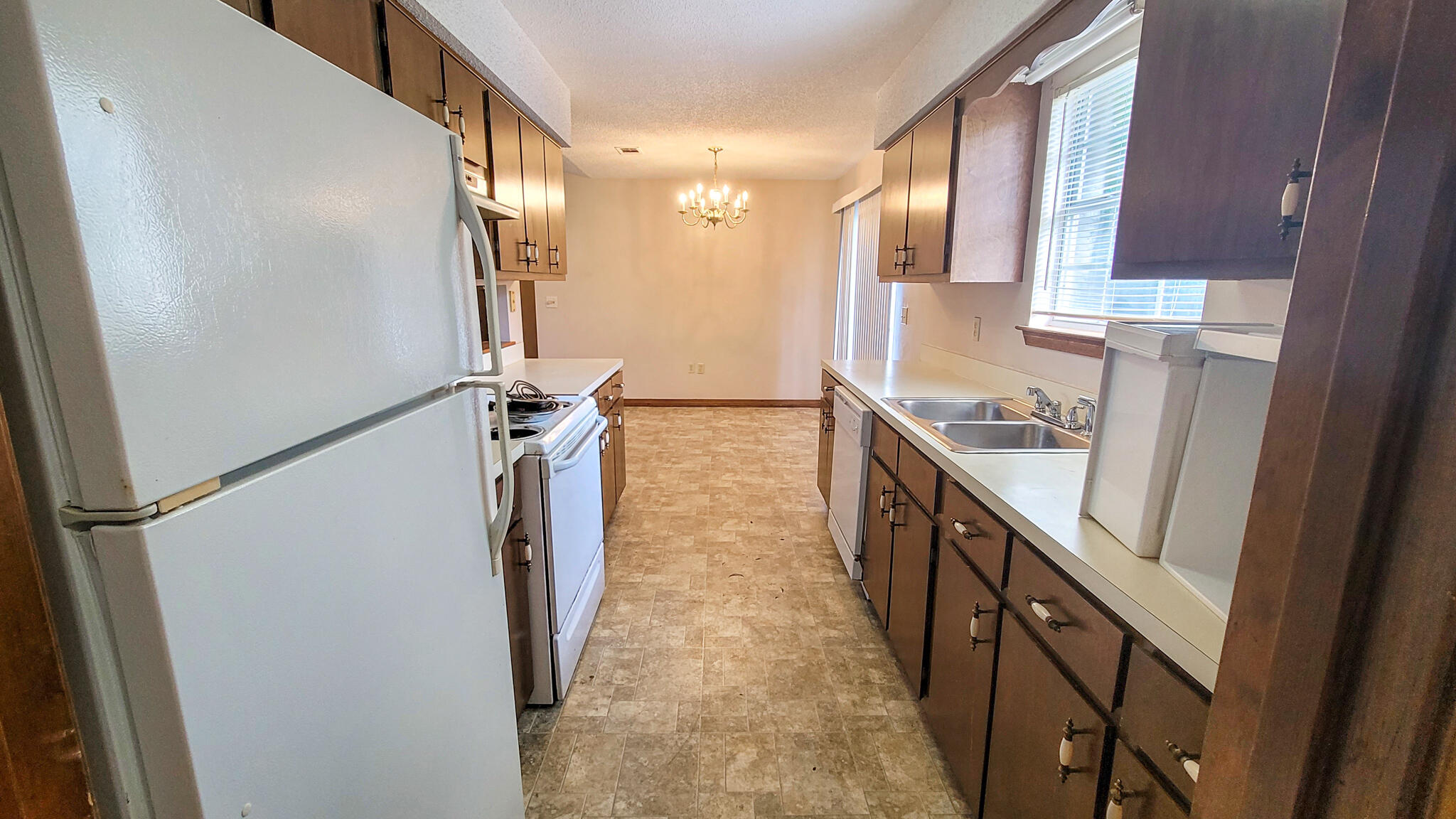 329 Ray Avenue Crestview, FL 32536 - Photo 6 of 14 a bathroom with a sink a mirror and a shower
