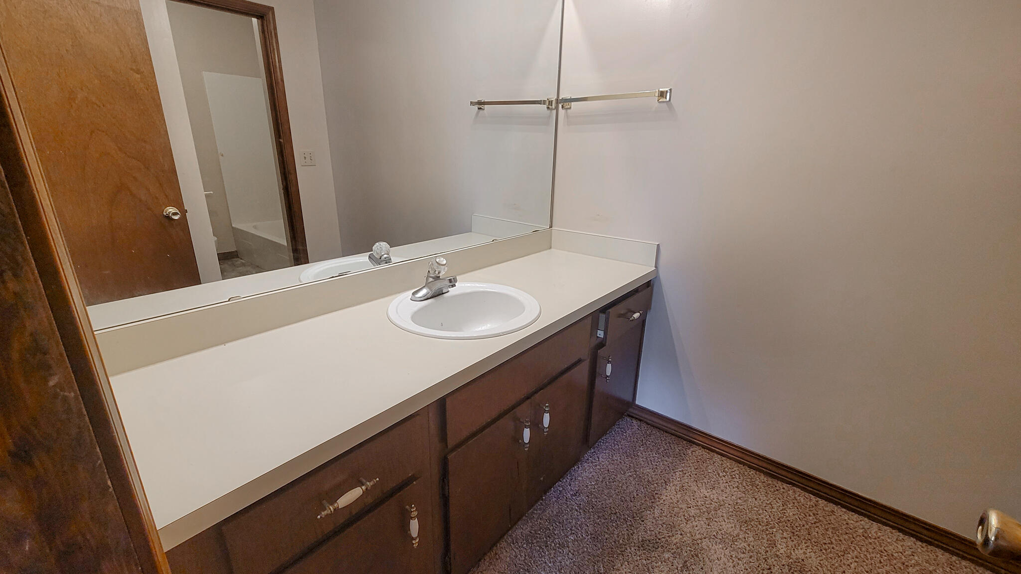 329 Ray Avenue Crestview, FL 32536 - Photo 8 of 14 a bathroom with a sink and a mirror