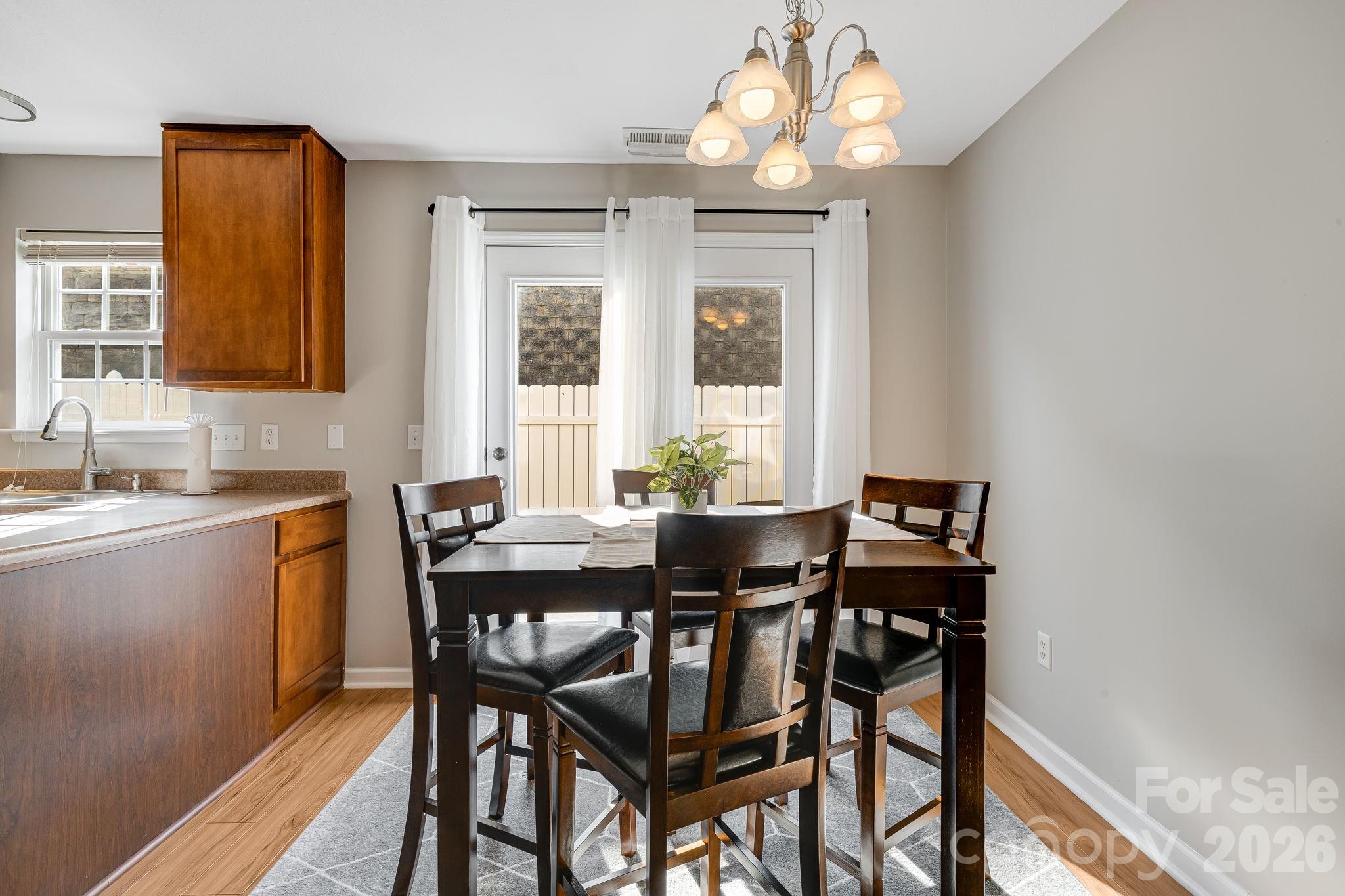 49 Farington Circle Fletcher, NC 28732 - Photo 11 of 32 a view of a dining room with furniture window and outside view