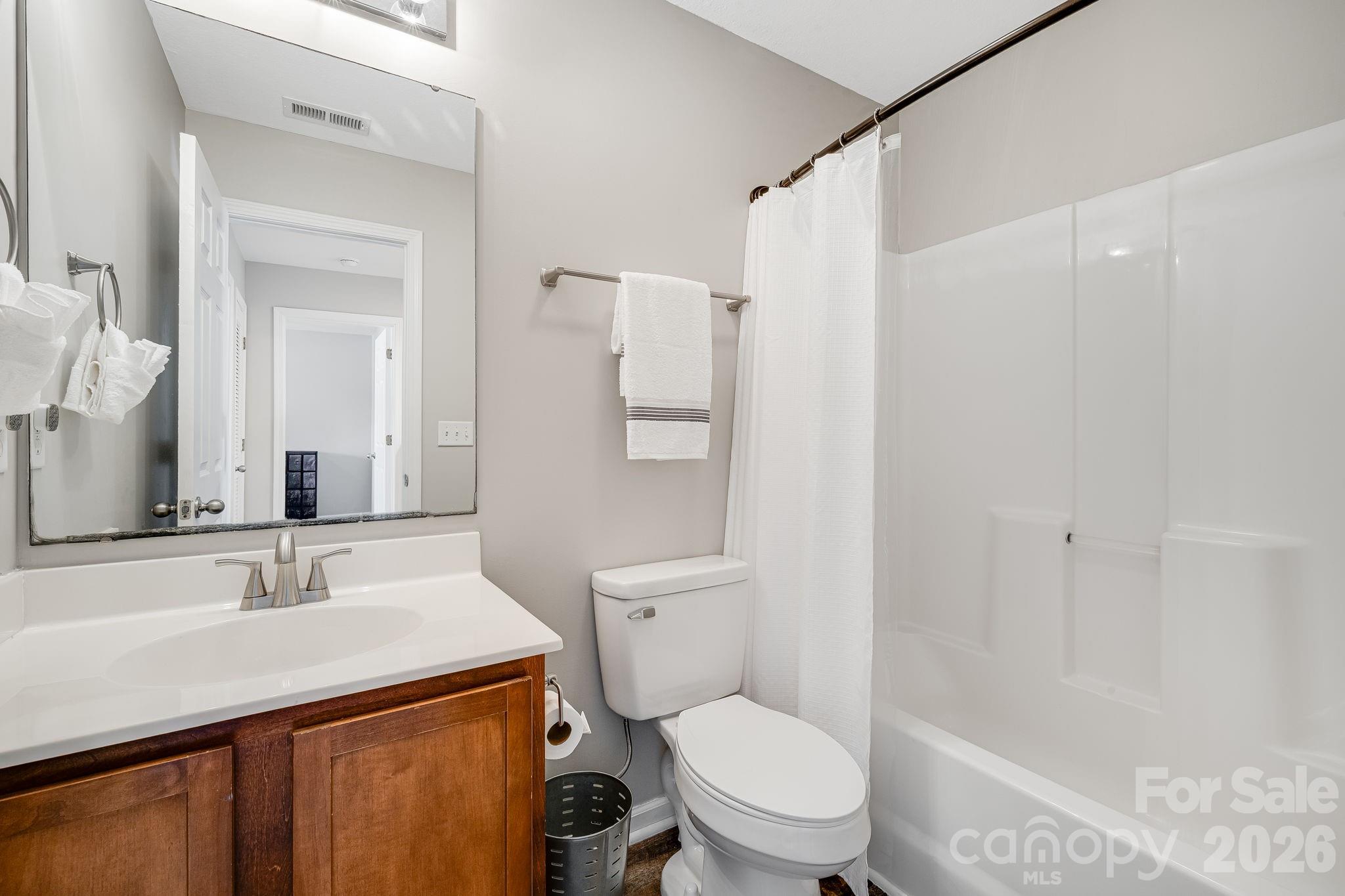 49 Farington Circle Fletcher, NC 28732 - Photo 28 of 32 a bathroom with a sink a toilet and shower