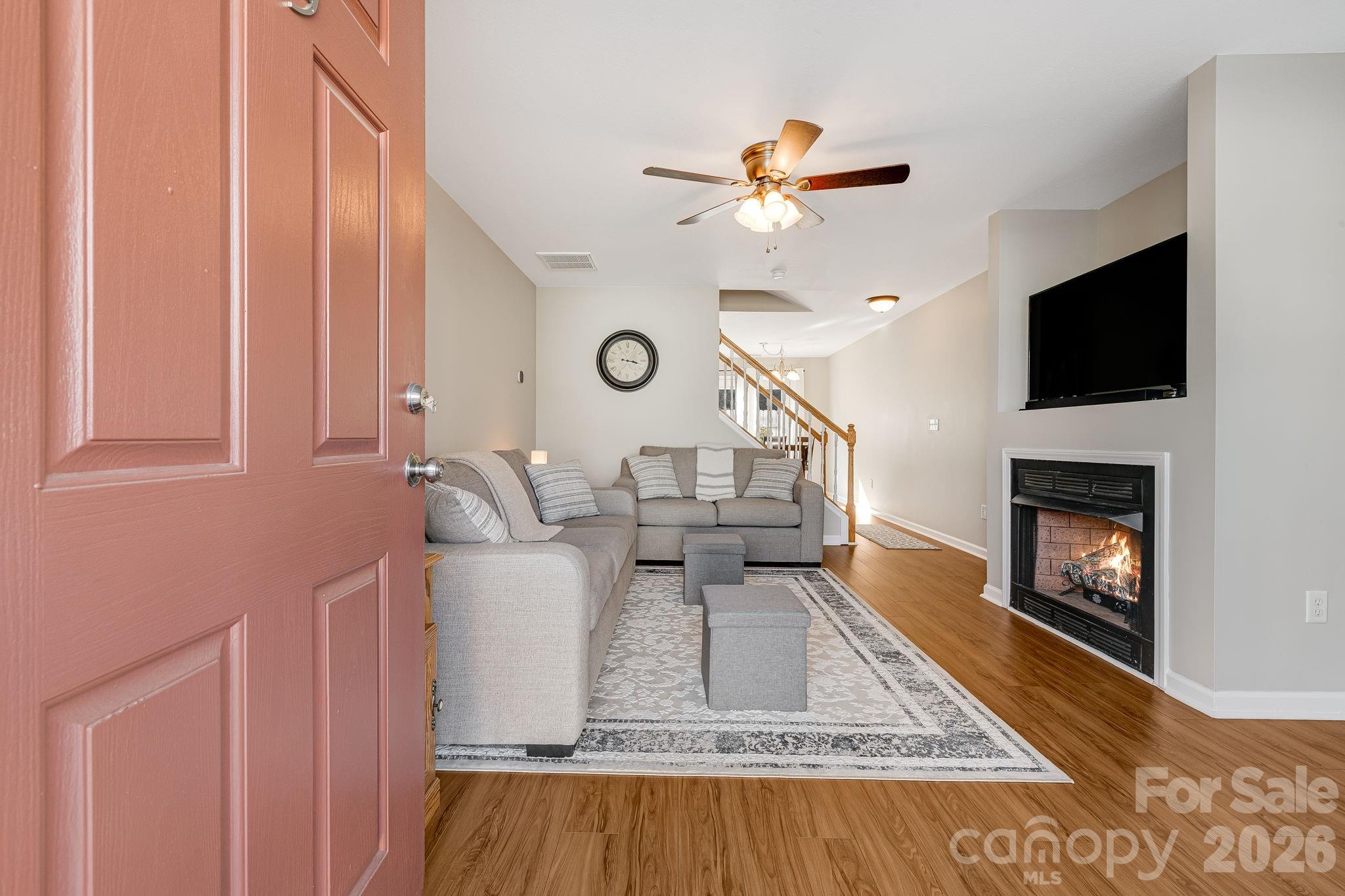 49 Farington Circle Fletcher, NC 28732 - Photo 5 of 32 a living room with furniture and a fireplace