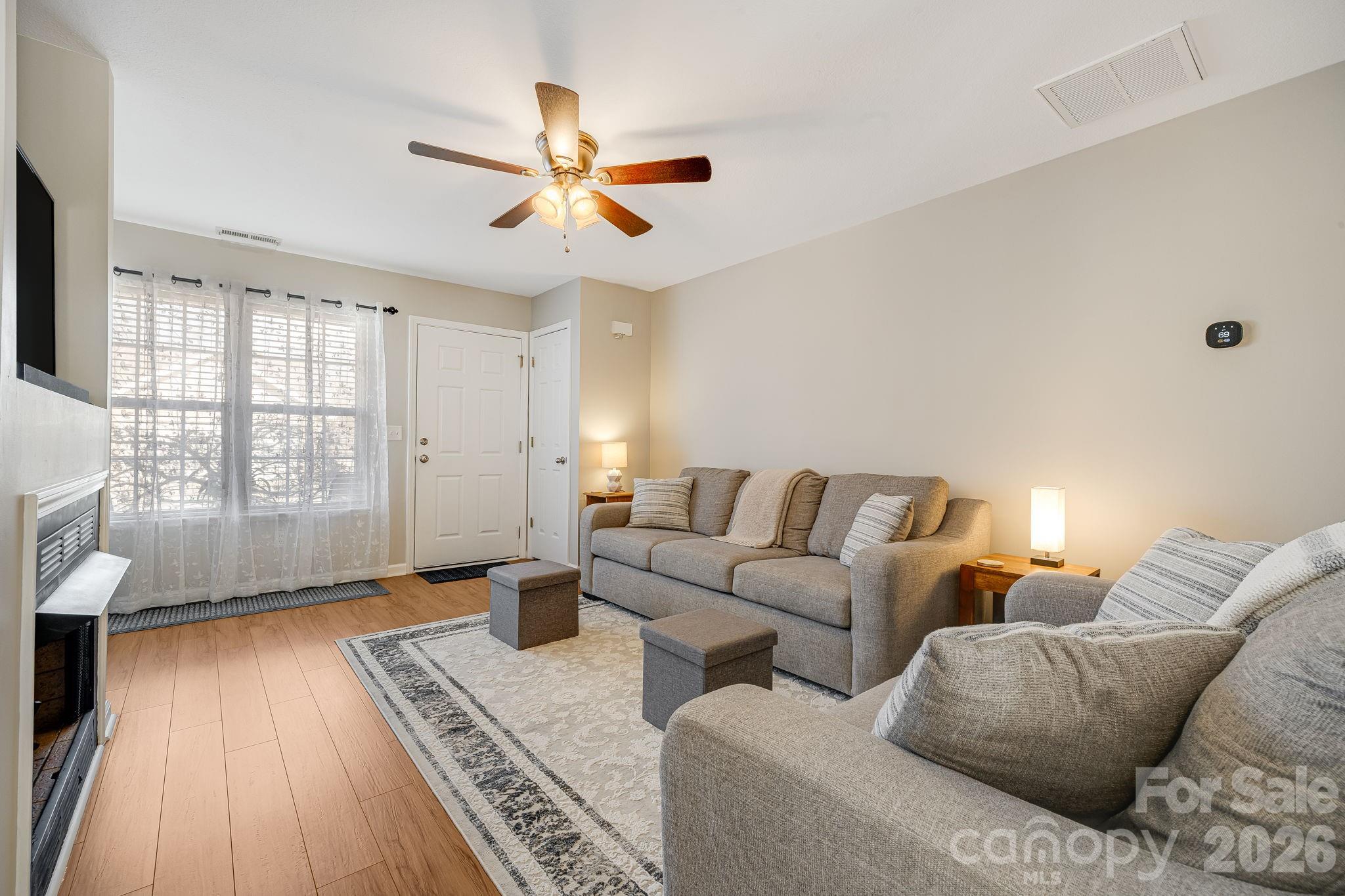 49 Farington Circle Fletcher, NC 28732 - Photo 8 of 32 a living room with furniture and a large window