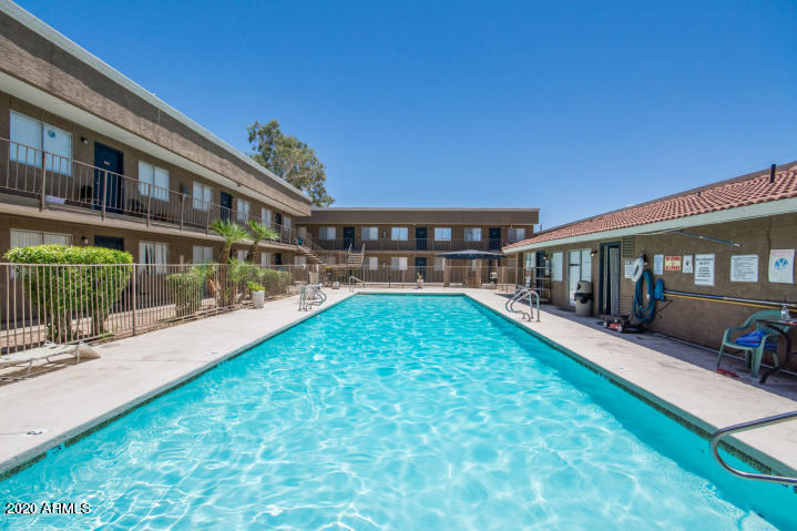 a view of a house with a swimming pool